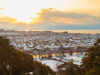 top view of snow city while sunrise or sunset in japan winter