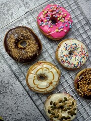 Delicious donat on the table isolated concrete background