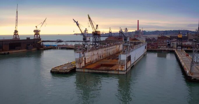 Aerial: Dogpatch Pier 70 Area, Cranes in Water, San Francisco, USA