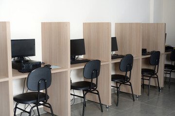 office desks with computers, computer study room, call center, technology education