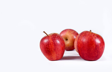 delicious red apples, natural healthy fruit isolated on white background with space for text.