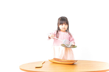 料理をする子供