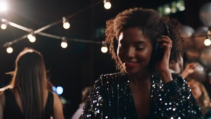 beautiful dj woman playing music at glamorous rooftop party celebration dance enjoying fancy social event wearing stylish fashion dancing performing live in club at night 4k footage