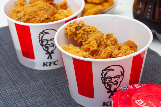 Russia Kostroma 04 24 2021 A lot of harmful and delicious fast food from KFC and McDonald's on the table at home