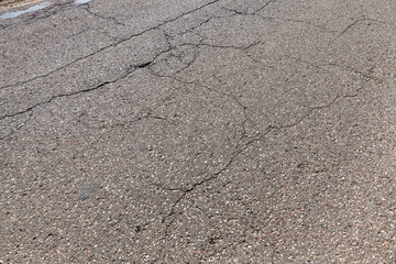 repair of a broken and damaged paved road