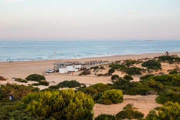 Fototapeta na wymiar La Barrosa beach, at low tide, in Sancti Petri.