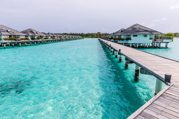 Fototapeta na wymiar water bungalows in the Maldives