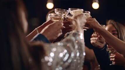 group of stylish friends celebrating at glamorous rooftop party event making toast drinking champagne at formal social gathering enjoying evening celebration at night 4k