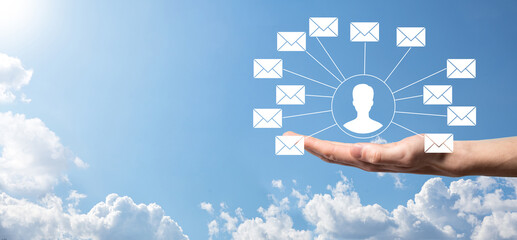 Male hand holding letter icon,email icons .Contact us by newsletter email and protect your personal...