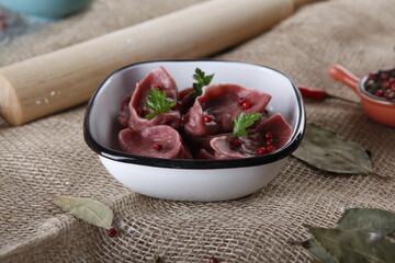 red dumplings, dumplings on a wooden board