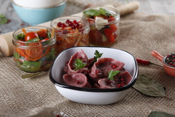 red dumplings, dumplings on a wooden board