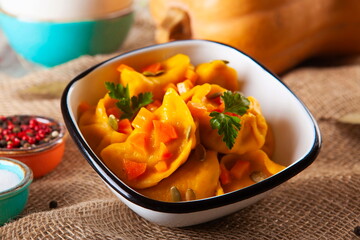 yellow dumplings, dumplings on a wooden board