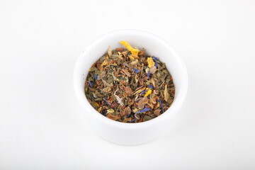 tea leaves for brewing in a white cup