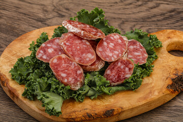 Fototapeta premium Iberian pork Fuet sausage slices