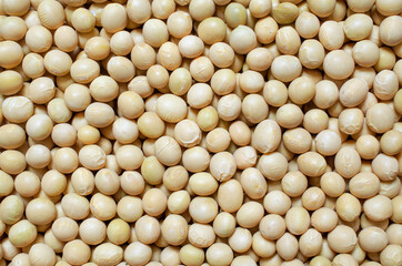 Closed up dry organic soybean seed background. Concept of healthy or diet food ingredient and agricultural product