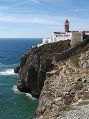 Fototapeta na wymiar Lighthouse on the coast of the Algarve