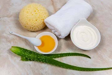 Aloe vera  wellness  therapy  with towel on marble background
