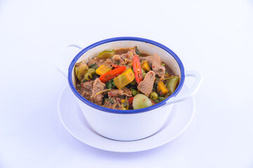 Hot spicy curry in the white bowl.