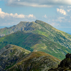 view of a Dumbier mountain top shooted from Chopok, famous Low Tatra mountain with its beautiful scenery of summer surroundings