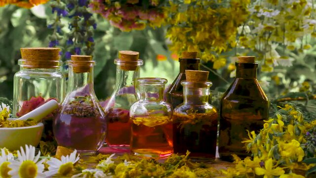 Bottled herbal tincture, homeopathy. Selective focus.