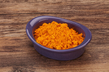 Tumeric powder in the bowl