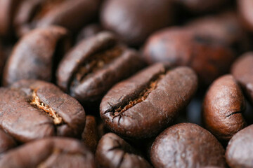 roasted coffee bean background extrime macro close up, top view.
