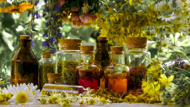 Bottled herbal tincture, homeopathy. Selective focus.