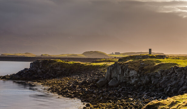 The island Videy in Iceland at sunrise in quite dramatic but beautiful light.