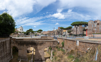 panoramic view at via dei Fori imperati with the antique rome with forum romanum and the archaelogical sites