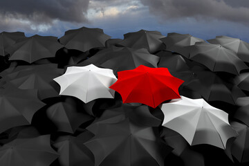 Lots of black umbrellas and white-red-white umbrellas against the backdrop of a stormy sky.