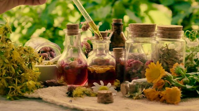 Bottled herbal tincture, homeopathy. Selective focus.