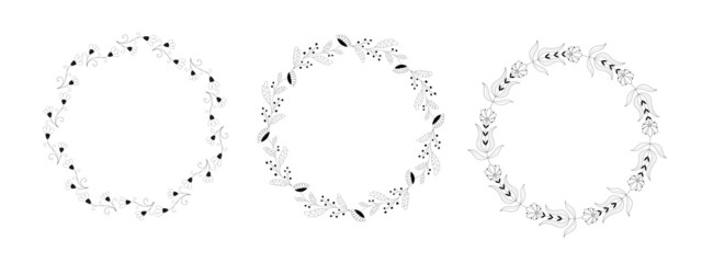 Set of vector wreaths in black ink on a white background. Flowers and herbs are hand drawn. Natural plants from сhamomile, aster. Botany and flora. Round design for medicine, postcards, cosmetics.