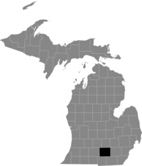 Black highlighted location map of the Jackson County inside gray map of the Federal State of Michigan, USA