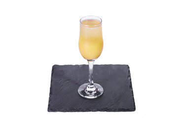 Mimosa cocktail isolated on white background