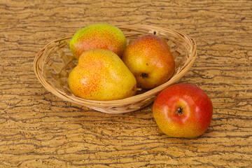 Pear heap in the wooden basket