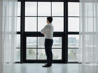 man in front of the window