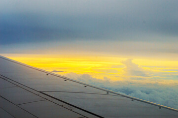 Fototapeta na wymiar Sunrise view from airplane