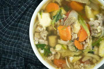 Clear vegetable soup with minced pork