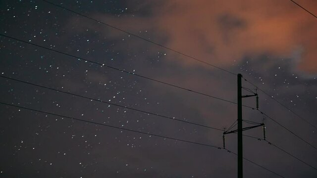 4K Night Starry Sky With Glowing Stars. Close Up Power Lines In Starry Sky Background Time Lapse, TimeLapse, Time-Lapse