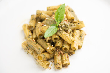 Rigatoni with pesto sauce.Italian pasta food