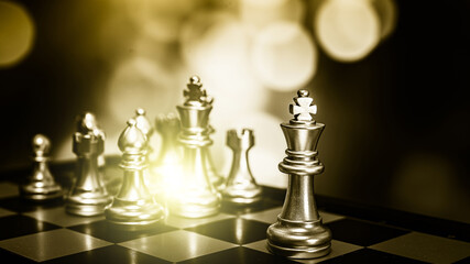 Closeup of chess characters on board games. to represent decision making in term of business...