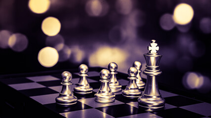 Closeup of chess characters on board games. to represent decision making in term of business strategy to find out the best solution to meet target objective and goal.	
