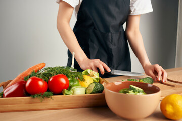 Obraz na płótnie Canvas cooking salad fresh vegetables slicing health vitamins
