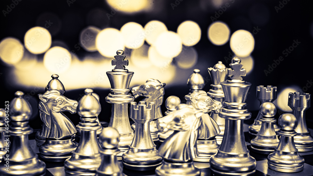 Poster closeup of chess characters on board games. to represent decision making in term of business strateg