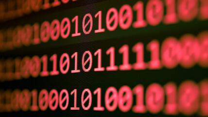 Abstract background of digital binary code of software. Programming software code on computer screen which develop by the programmer to solve the business requirement.