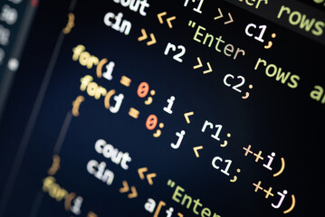 Fototapeta premium Abstract background of digital binary code of software. Programming software code on computer screen which develop by the programmer to solve the business requirement. 