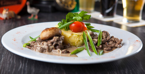 restaurant dish with beautiful background with phone board and tablecloth