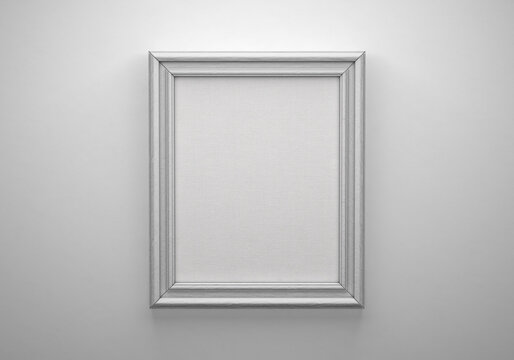 The white color picture vertical frame on white wall with textured blank canvas, 3D mockup