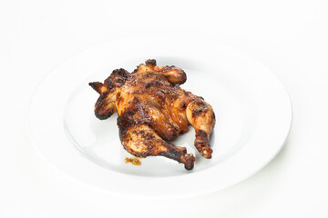 whole fried chicken on a wooden cutting board