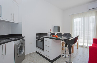 Interior design of luxury apartment living room with kitchen
